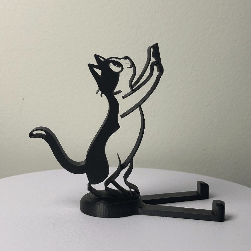 抽象的な中空ラインの猫型スマホスタンド、ミニマリストなキティ - Essential Tablet Accessories のレビューと価格